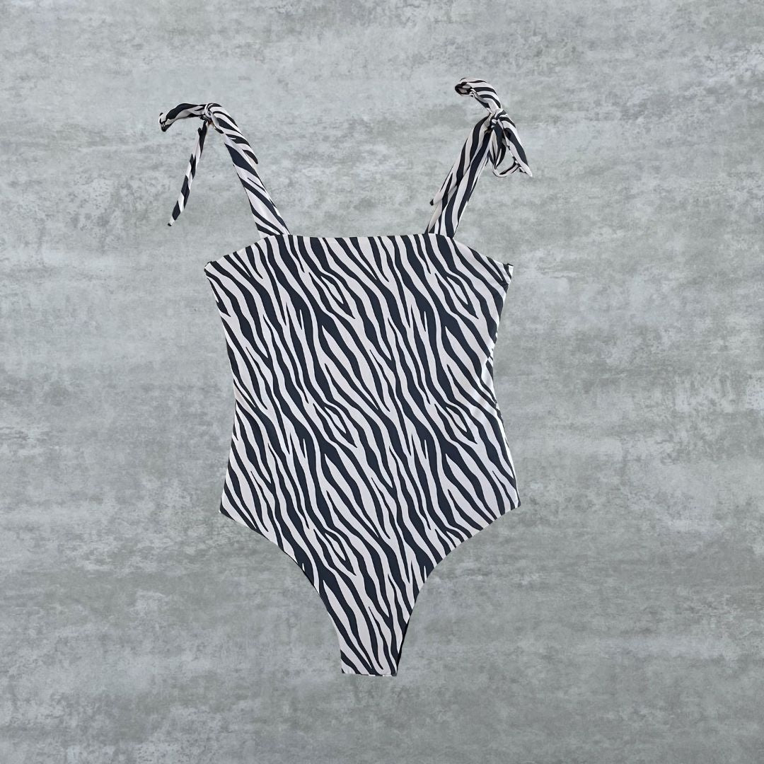 Entera Colán zebra reversible a negro